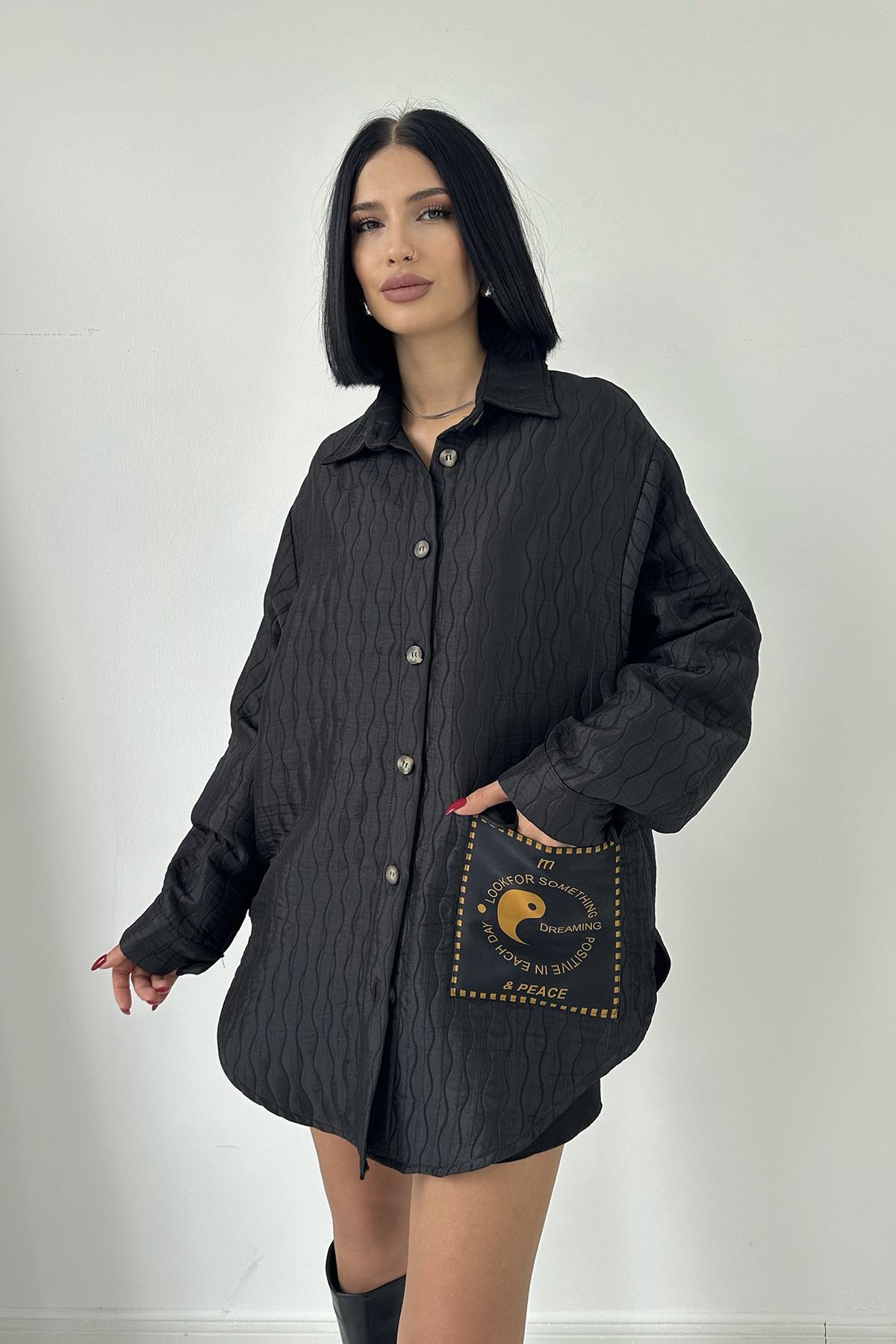 قميص شتائي باللون الأسود