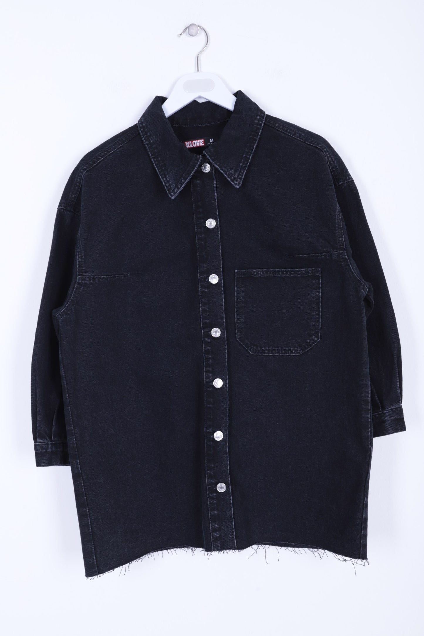 قميص جينز باللون الأسود