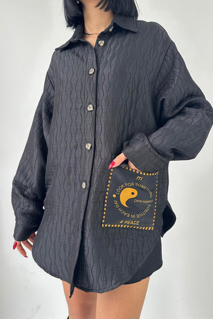 قميص شتائي باللون الأسود